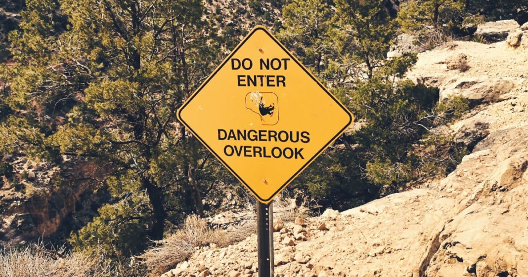 A warning sign is seen at Arizona's Grand Canyon in an undated stock photo.