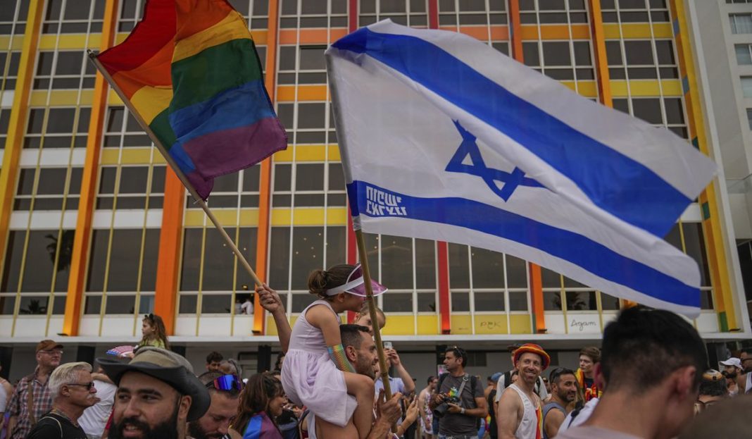 Tens of thousands join Tel Aviv Pride parade, celebrating gains and wary of Israeli government
