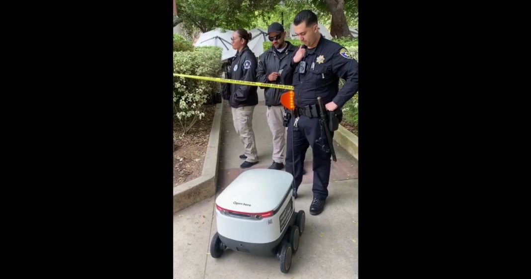 This X screen shot shows a delivery robot being denied access to a pro-Palestinian protester encampment on UCLA during May 23, 2024.