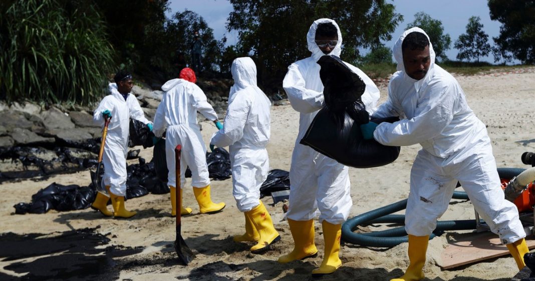 Oil spill cleanup underway in Singapore after dredger hits tanker