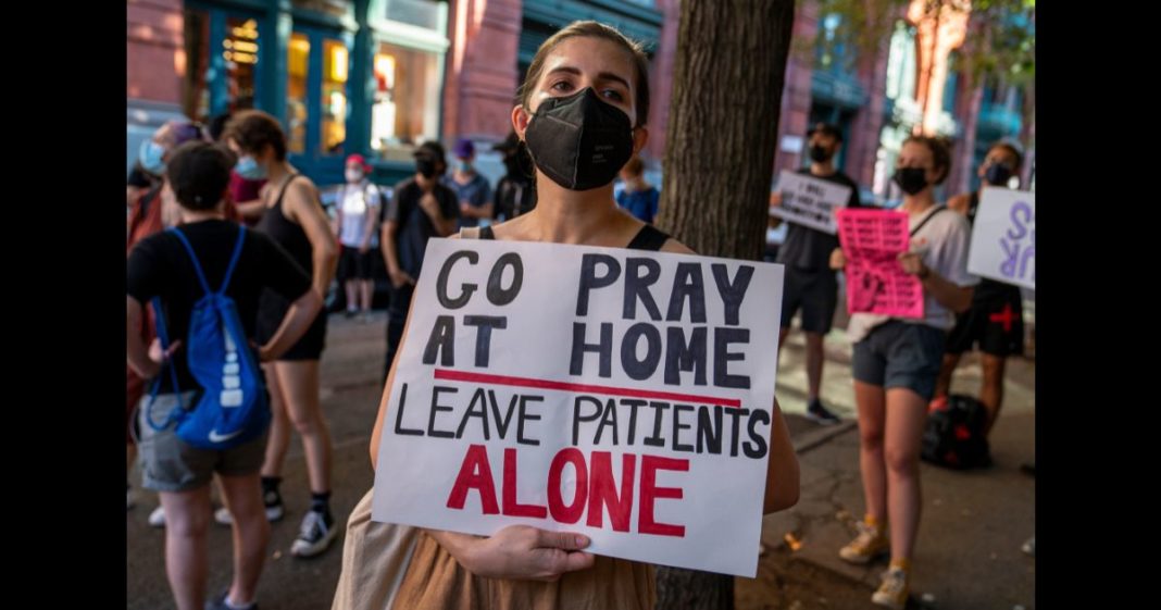 Pro-abortion rights protesters demonstrate outside of a Catholic church in downtown Manhattan on August 6, 2022 in New York City.