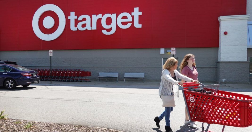 Customers shop at a Target store in Chicago on Aug. 16, 2023.