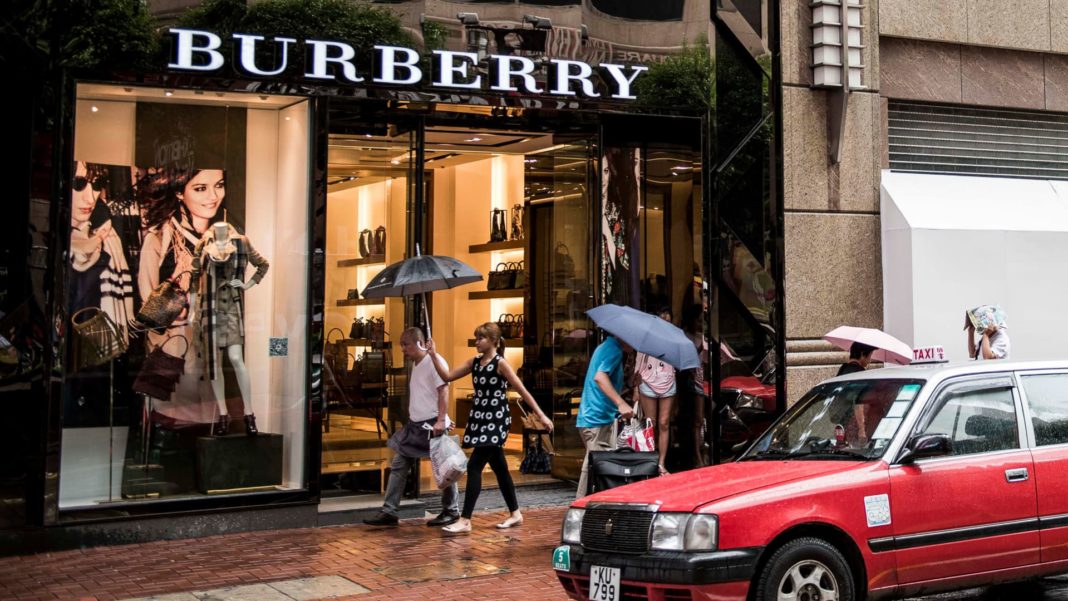 Burberry shares drop 15% after the luxury giant issues profit warning and replaces CEO