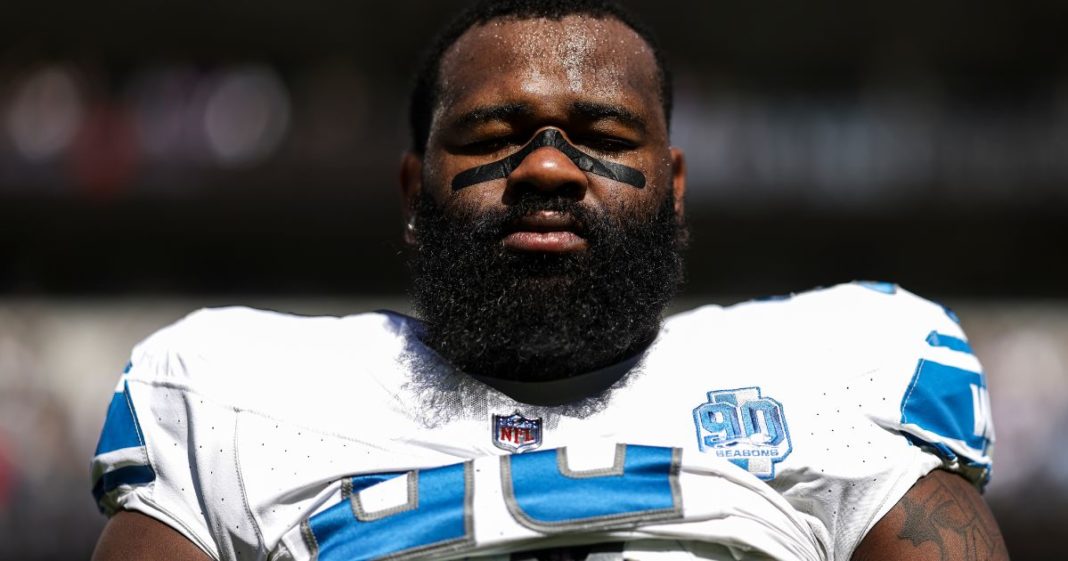 Isaiah Buggs of the Detroit Lions looks on during the national anthem prior to an NFL football game between the Baltimore Ravens and the Detroit Lions in Baltimore, Maryland, on Oct. 22, 2023.