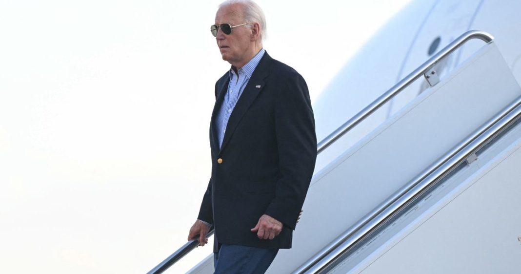 President Joe Biden disembarks from Air Force One upon arrival at Delaware Air National Guard Base in New Castle, Delaware, on Friday.