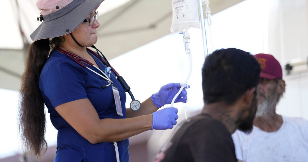 Street medics treat heat illnesses among homeless people as temperatures rise