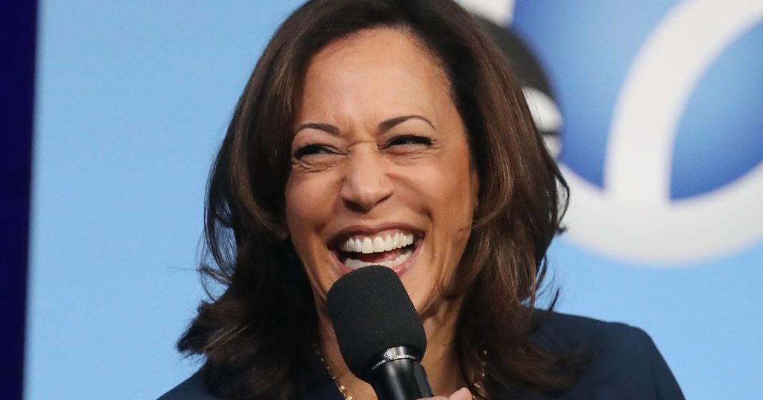 Then-Democratic presidential candidate Sen. Kamala Harris laughs at a Democratic presidential forum on Latino issues in Los Angeles, California, on Nov. 17, 2019.