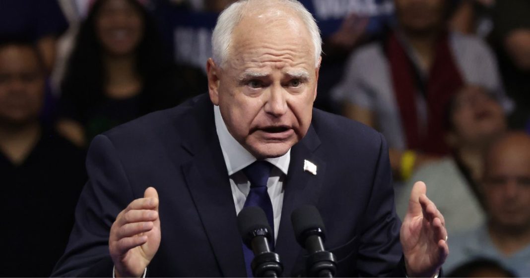 Gov. Tim Walz speaks during a campaign rally with Vice President Kamala Harris in Philadelphia, Pennsylvania, on Tuesday.