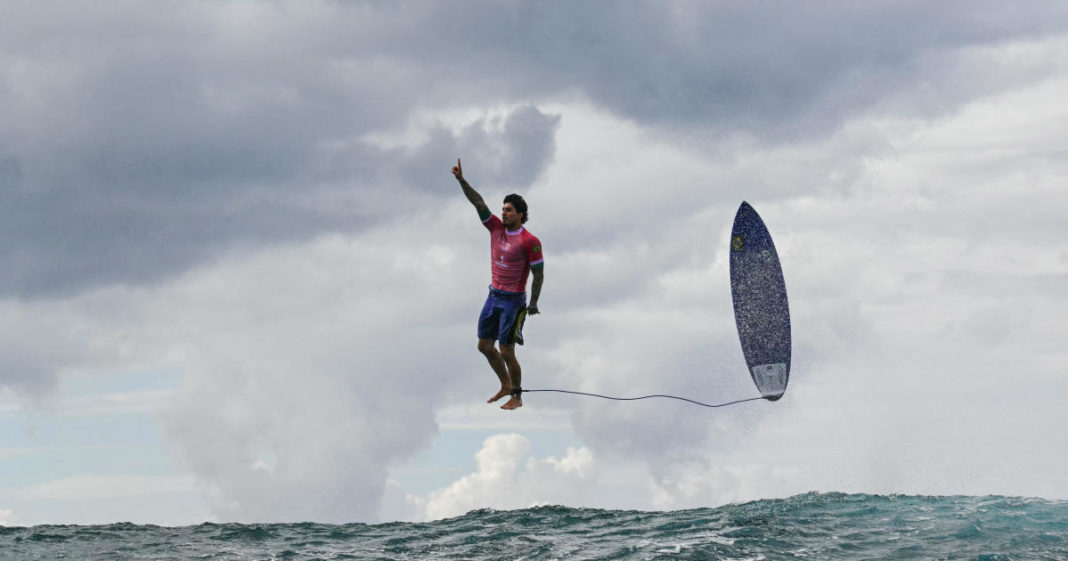 As stunning Olympic surfing photo goes viral, some question whether it's too good to be true