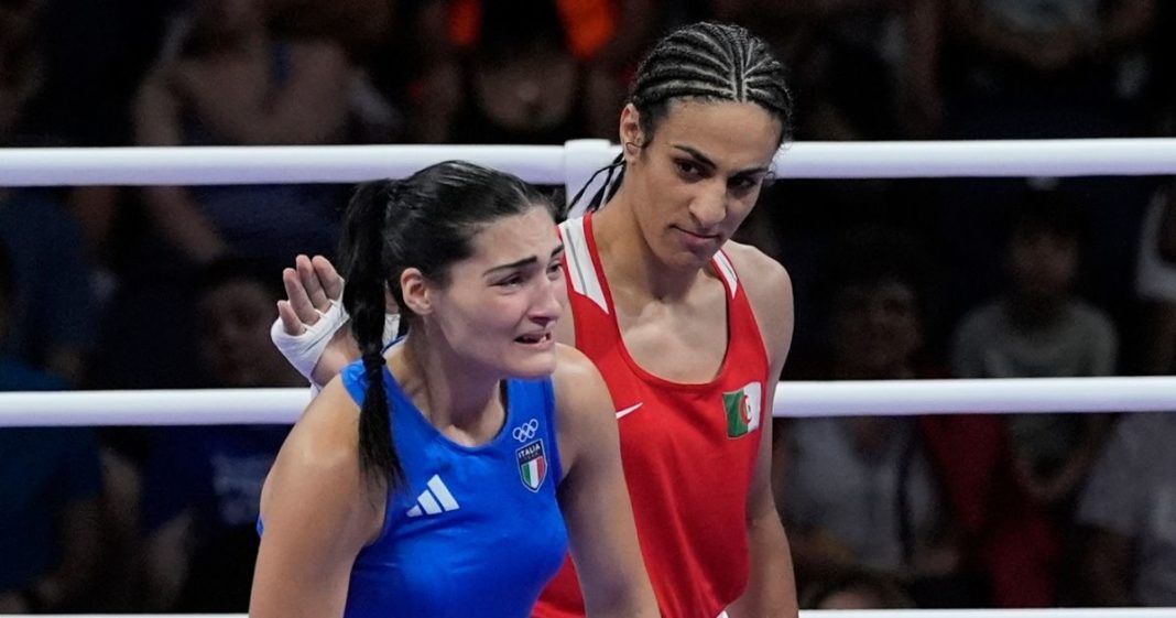 Algeria's Imane Khelif, in red, acknowledges Italy's Angela Carini at the end of their women's preliminary boxing match at the 2024 Summer Olympics, Thursday in Paris.