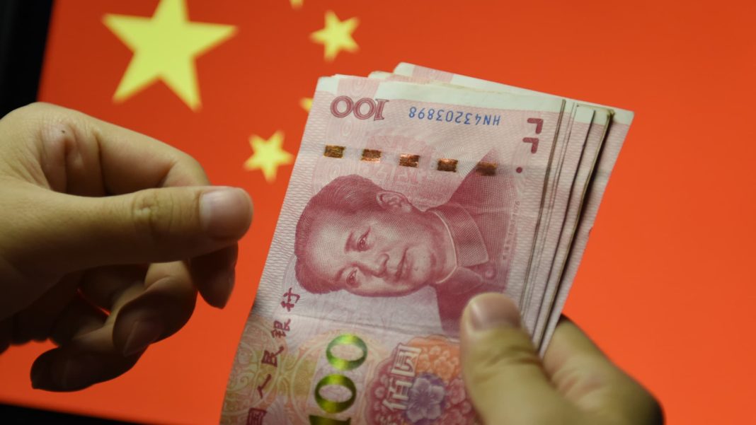 China's new loans hit a 15-year low, but investors 'should not panic'