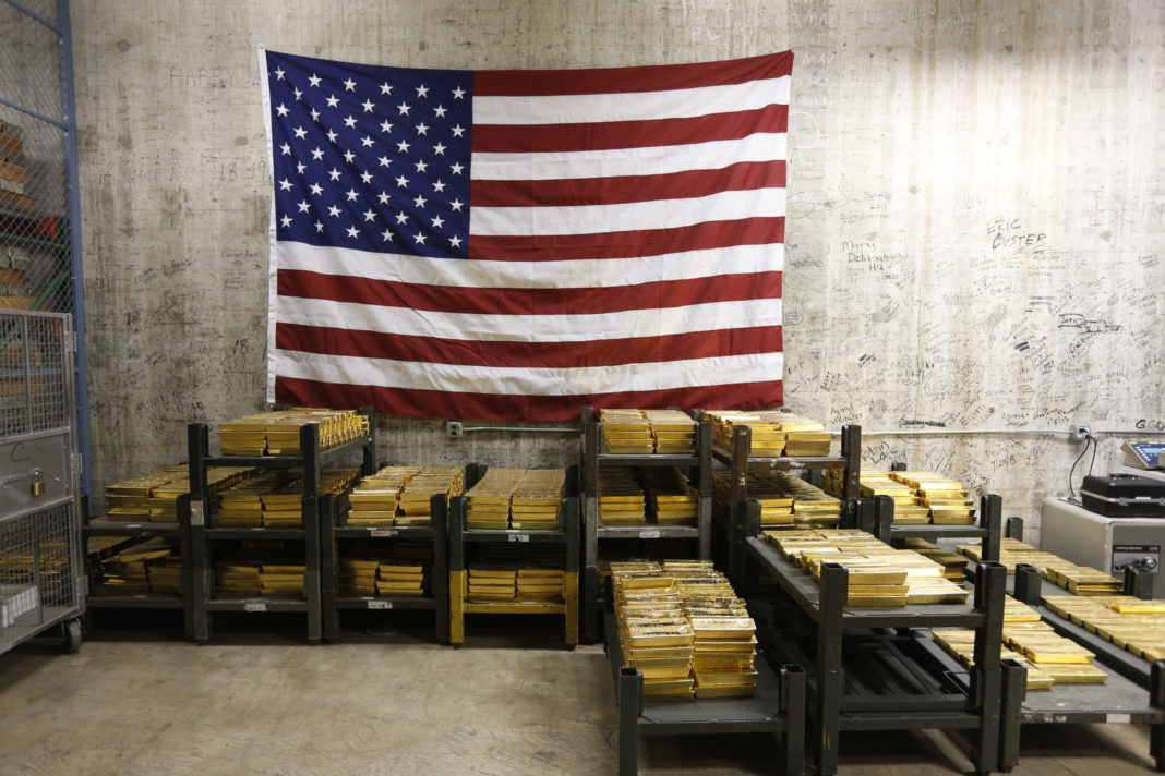 Gold bars are stacked in a vault at the U.S. Mint in West Point, New York, on July 22, 2014.