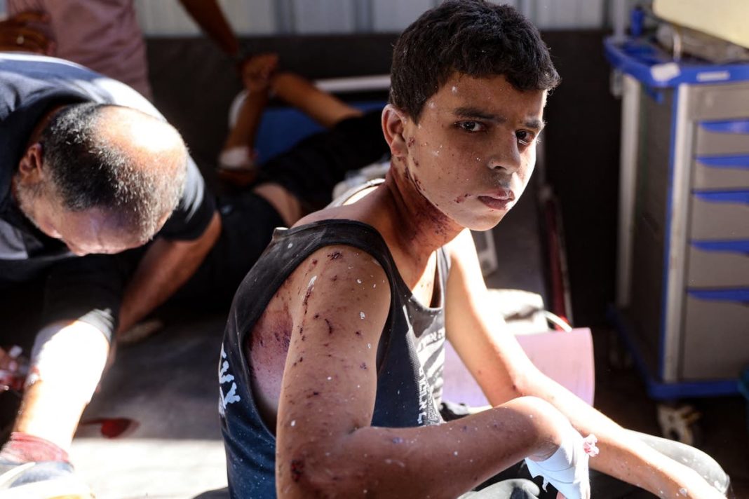 Israeli strike on Gaza school kills more than 100 during morning prayer – latest