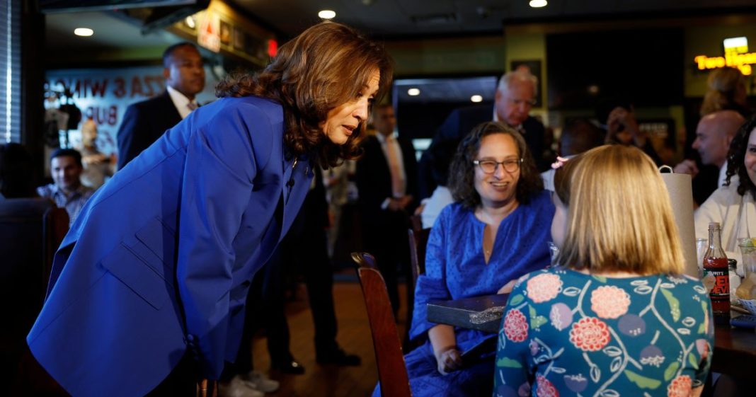 Vice President Kamala Harris speaks people in Primanati Bros. Restaurant in Moon Township, Pennsylvania, on Sunday, but some are accusing her of using paid actors for a photo op in the restaurant.