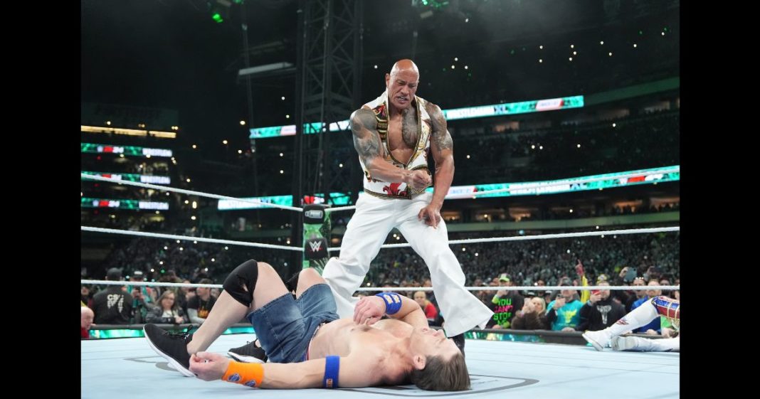 The Rock fights against John Cena on Night Two at WrestleMania 40 at Lincoln Financial Field on April 7, 2024 in Philadelphia, Pennsylvania.