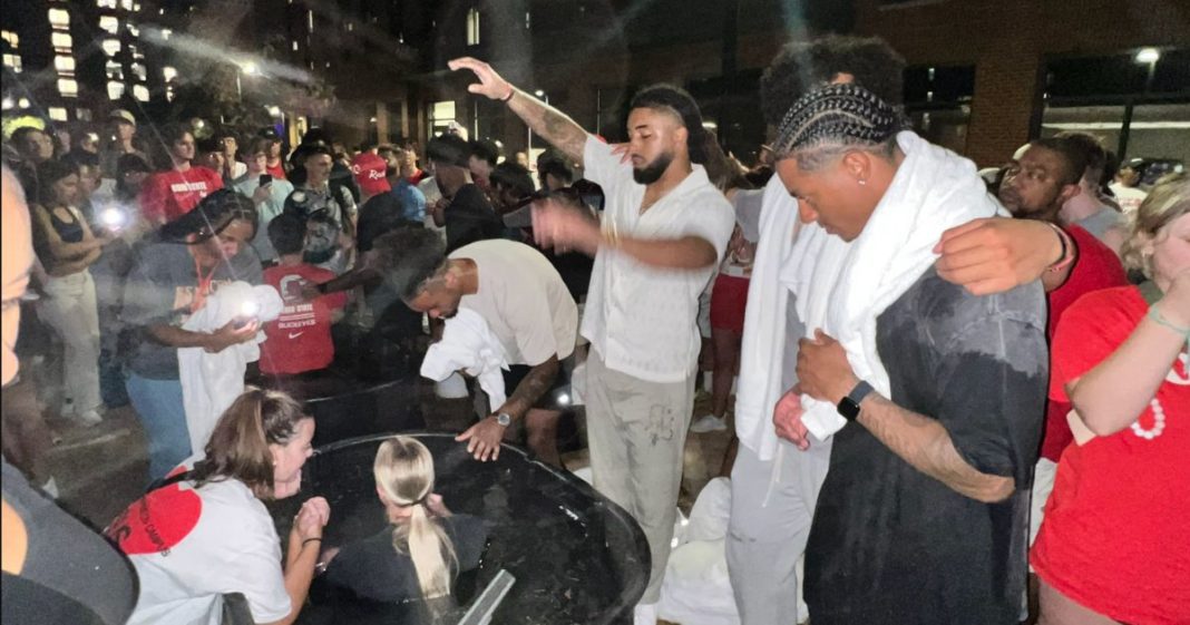 Ohio State football players led their fellow students in worship and baptism on the campus.