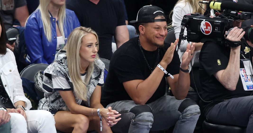 Brittany Mahomes and Patrick Mahomes of the Kansas City Chiefs look on during Game Three of the 2024 NBA Finals between the Boston Celtics and the Dallas Mavericks.