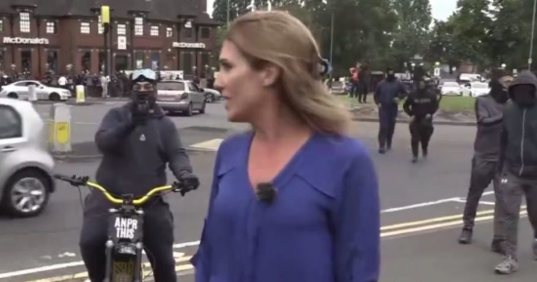 While covering the protests in Birmingham, England, on Monday, a Sky News journalist was surrounded by Muslim protesters and forced off the air.