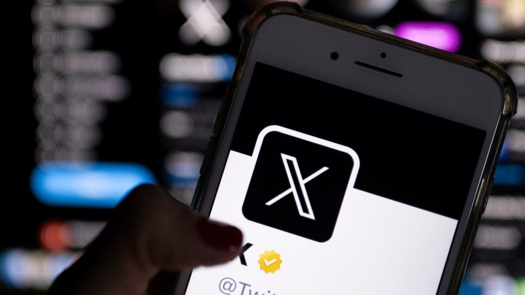 24 July 2023, Berlin: ILLUSTRATION - Twitter's official profile on a smartphone screen features the white letter X on a black background. Twitter owner Musk is trying to establish X as the new name for the short messaging service. Photo by: Monika Skolimowska/picture-alliance/dpa/AP Images