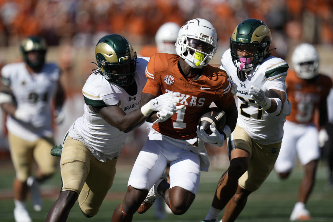 Texas wide receiver Johntay Cook II (1) during the second half of an NCAA college football game ...