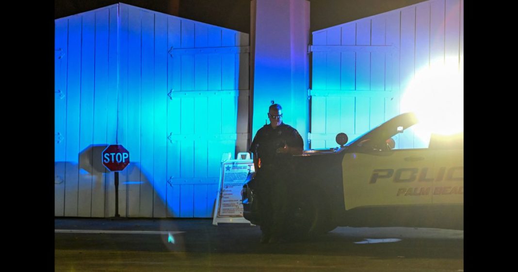 A police car is seen outside former US President Donald Trump's residence in Mar-A-Lago, Palm Beach, Florida on August 8, 2022. Former US president Donald Trump said August 8, 2022 that his Mar-A-Lago residence in Florida was being raided by FBI agents in an act of "prosecutorial misconduct."