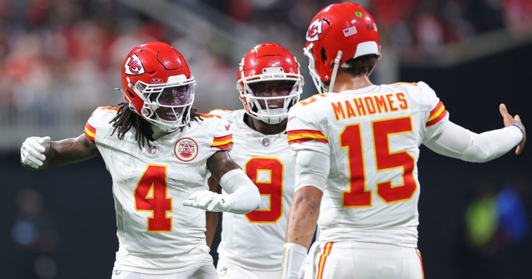 Rashee Rice, left, of the Kansas City Chiefs celebrates a touchdown with Patrick Mahomes, right, and JuJu Smith-Schuster, center, during the second quarter against the Atlanta Falcons in Atlanta, Georgia, on Sept. 22.