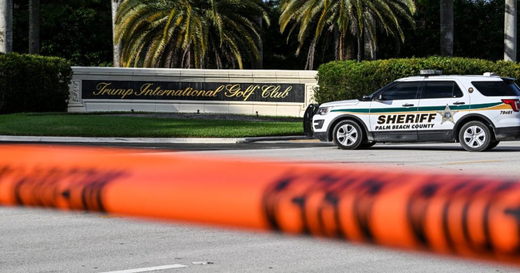 A sheriff's car blocks the street outside the Trump International Golf Club in West Palm Beach, Florida, on September 15, 2024 following a shooting incident at former US president Donald Trump's golf course. (Chandan Khanna - AFP / Getty Images)