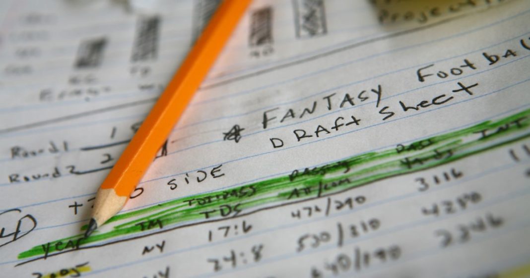 This stock image shows draft notes for a fantasy football team.