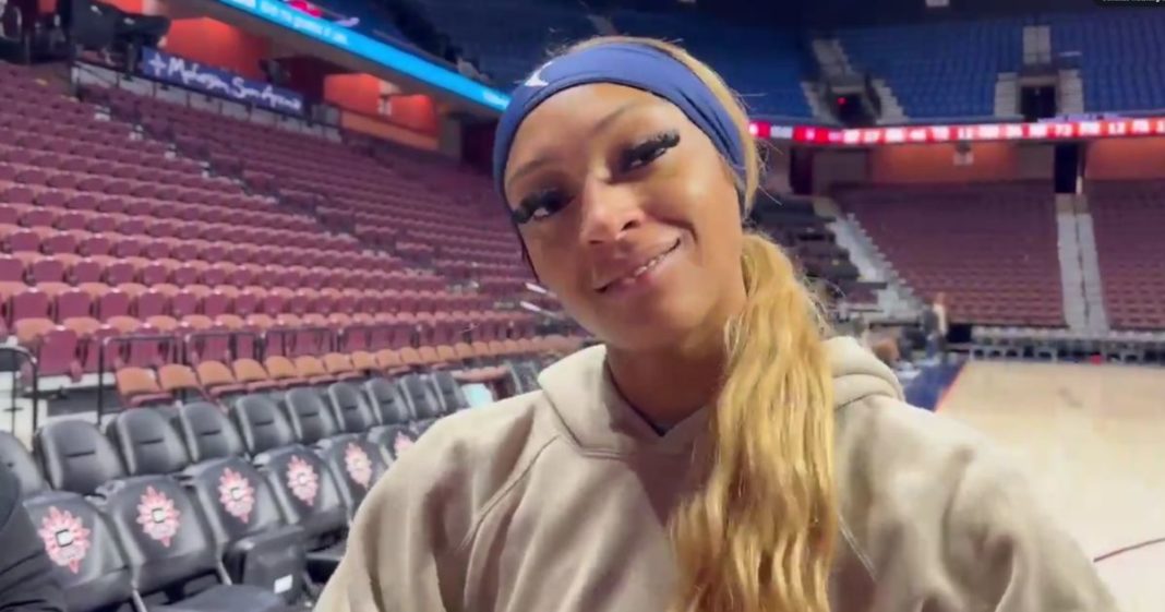 DiJonai Carrington of the Connecticut Sun appeared to smirk when asked whether she intentionally poked Indiana Fever's Caitlin Clark in the eye.