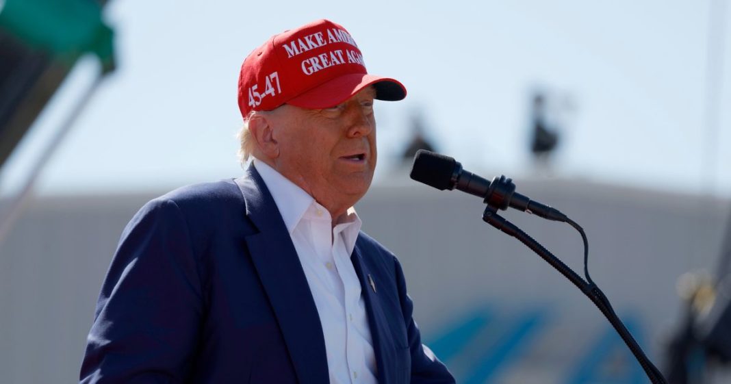 Republican presidential candidate former U.S. President Donald Trump speaks at a rally at the Aero Center Wilmington on September 21, 2024 in Wilmington, North Carolina.