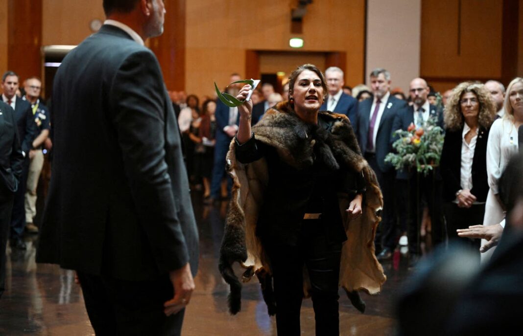 Australian Senator Lidia Thorpe stages a protest as Britain