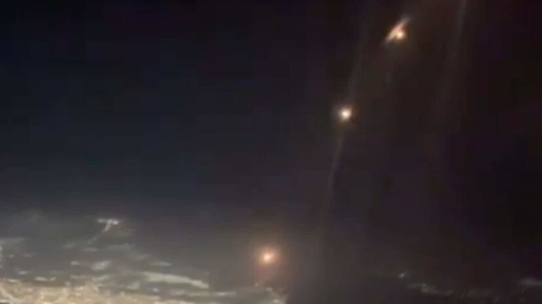 Chilling video from British Airways flight's cockpit shows Iran's missiles flying over Israel