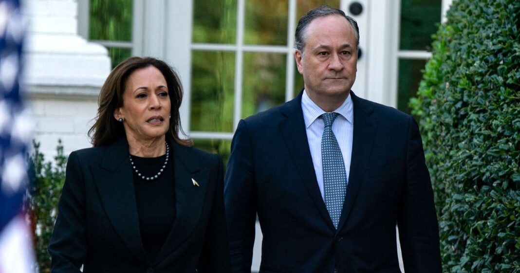 Vice President Kamala Harris, left, and second gentleman Doug Emhoff, right, arrive to deliver remarks before planting a pomegranate tree at the Vice President's residence at the U.S. Naval Observatory in Washington, D.C., on Oct. 7.