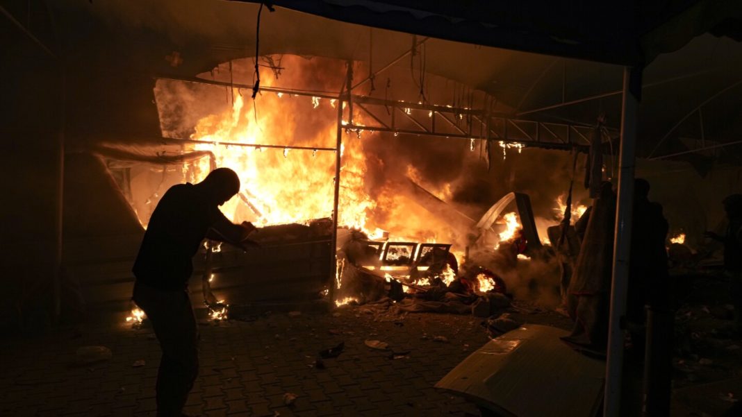 Israeli strike on hospital tent camp kills 4 and ignites a fire that burns dozens