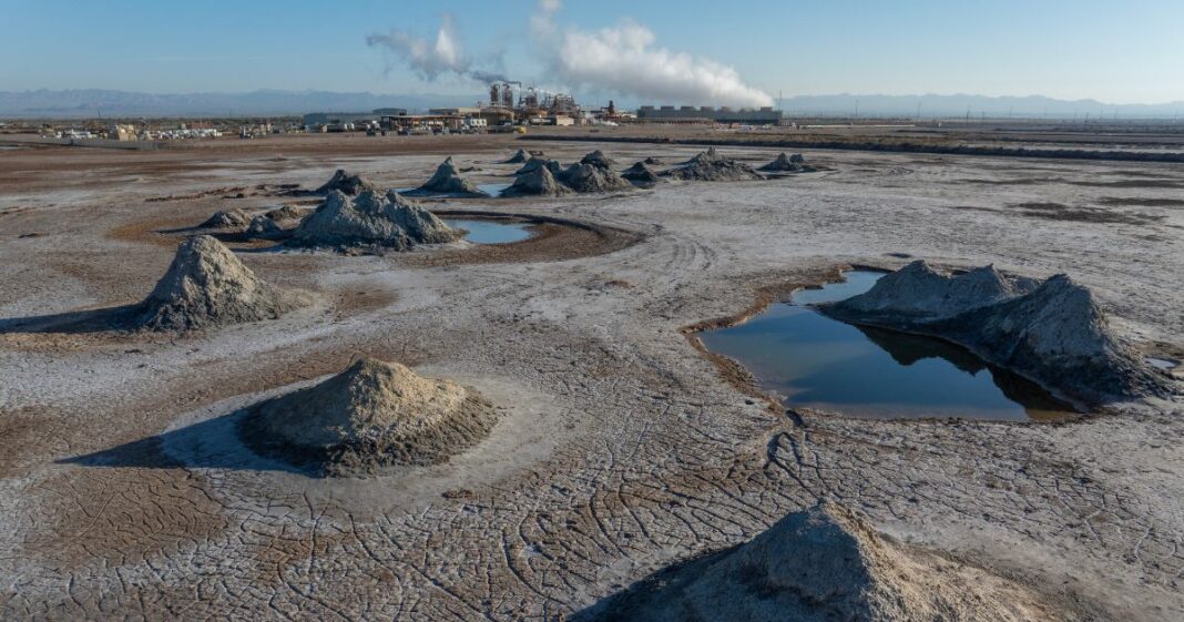 In an aerial view, mud pots, or fumaroles, and mud volcanoes are seen near the Hudson Ranch geothermal power plant on February 14, 2024 near Niland, California. Geothermal plants create steam power from boiling, mineral-rich brine drawn from deep under geothermal fields. A race is on to develop processing to separate raw lithium out of the waste stream to be used in the production of batteries for electric vehicles. This geothermal field at the eastern edge of the Salton Sea has is being called the future "Lithium Valley", with the potential to extract 18 million metric tons of lithium from this geothermal field, roughly the equivalent of 382 million electric vehicle batteries, according to a report by the Lawrence Berkeley National Laboratory. The area is believed to have the world's highest concentration of lithium contained in geothermal brines.