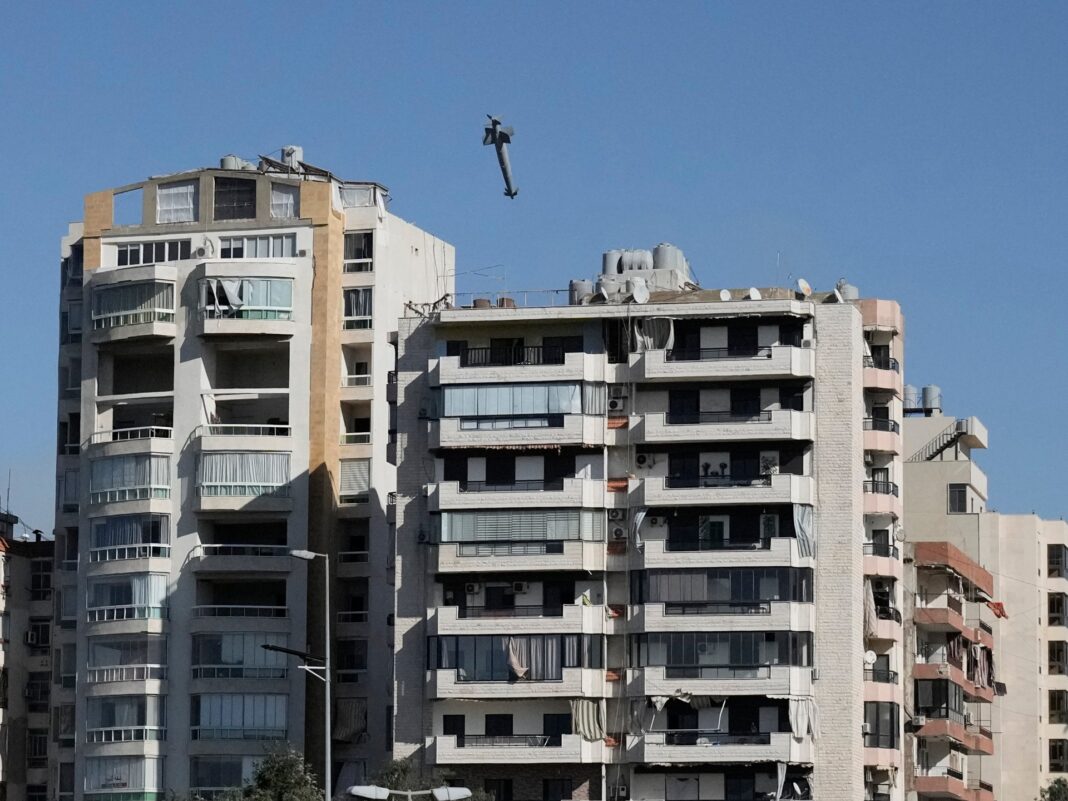 Photos: Exact moment Israeli missile strikes building in Beirut