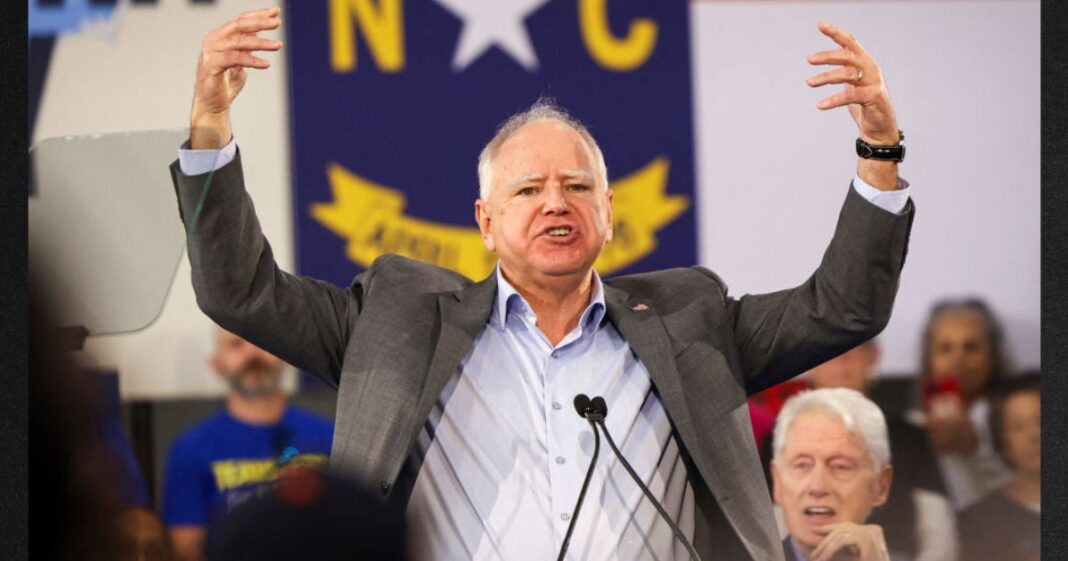 Democratic vice presidential nominee Tim Walz gestures as he speaks during a Get-Out-The-Vote rally with former US President Bill Clinton for Vice President and Democratic Presidential nominee Kamala Harris on the first day of North Carolina early voting in Durham, North Carolina, Thursday.