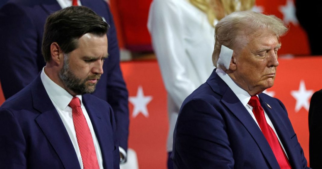 Republican vice presidential candidate J.D. Vance, left, and former President Donald Trump bow in prayer during the last day of the 2024 Republican National Convention on July 18.