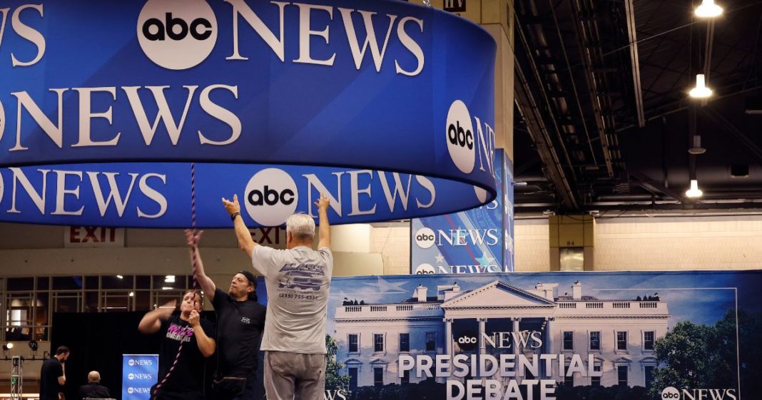 ABC News signage is installed in the media file center inside the Pennsylvania Convention Center in Philadelphia on Sept. 9, one day before the presidential debate.